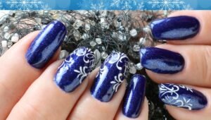 25 Snowflake Nail Ideas for a Cool Yet Cozy Manicure